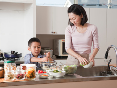 Family-Cooking Mother and Son Cooking Together